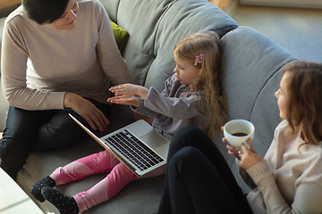 Image showing Happy loving family. Grandmother, mother and daughter spending time together