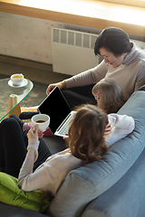 Image showing Happy loving family. Grandmother, mother and daughter spending time together