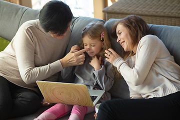 Image showing Happy loving family. Grandmother, mother and daughter spending time together