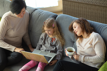 Image showing Happy loving family. Grandmother, mother and daughter spending time together