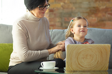 Image showing Happy loving family. Grandmother and grandchild spending time together