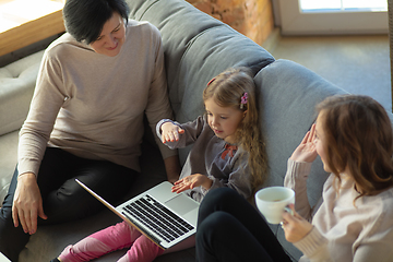 Image showing Happy loving family. Grandmother, mother and daughter spending time together