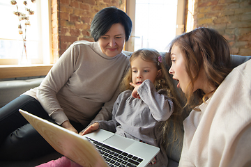 Image showing Happy loving family. Grandmother, mother and daughter spending time together