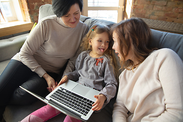 Image showing Happy loving family. Grandmother, mother and daughter spending time together