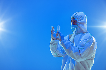 Image showing Medic in white hazmat protective suit, coronavirus illustration concept