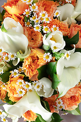 Image showing Close up of fashion modern bouquet of different flowers on wooden background