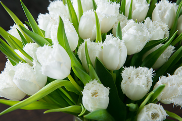 Image showing Close up of fashion modern bouquet of different flowers on wooden background