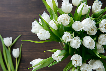 Image showing Close up of fashion modern bouquet of different flowers on wooden background