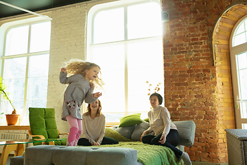 Image showing Happy loving family. Grandmother, mother and daughter spending time together