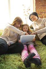 Image showing Happy loving family. Grandmother, mother and daughter spending time together