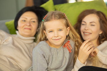 Image showing Happy loving family. Grandmother, mother and daughter spending time together