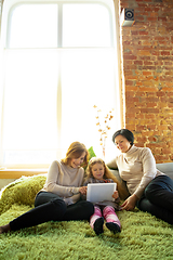 Image showing Happy loving family. Grandmother, mother and daughter spending time together