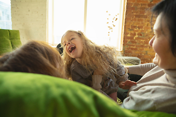 Image showing Happy loving family. Grandmother, mother and daughter spending time together