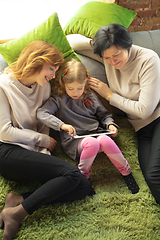 Image showing Happy loving family. Grandmother, mother and daughter spending time together