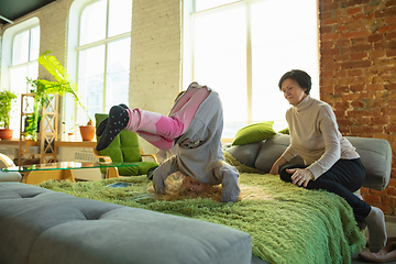 Image showing Happy loving family. Grandmother, mother and daughter spending time together