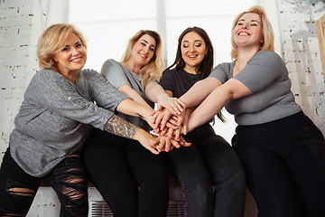 Image showing Young women in casual clothes having fun together. Bodypositive concept.