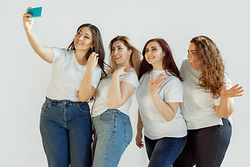 Image showing Young women in casual clothes having fun together. Bodypositive concept.