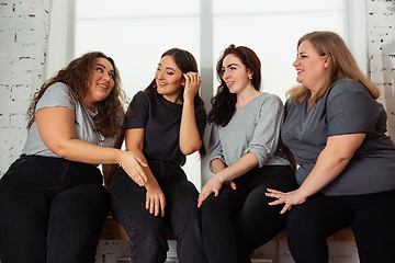 Image showing Young women in casual clothes having fun together. Bodypositive concept.