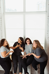 Image showing Young women in casual clothes having fun together. Bodypositive concept.