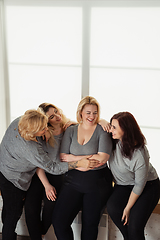 Image showing Young women in casual clothes having fun together. Bodypositive concept.