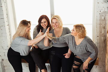 Image showing Young women in casual clothes having fun together. Bodypositive concept.