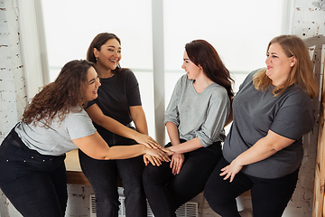 Image showing Young women in casual clothes having fun together. Bodypositive concept.