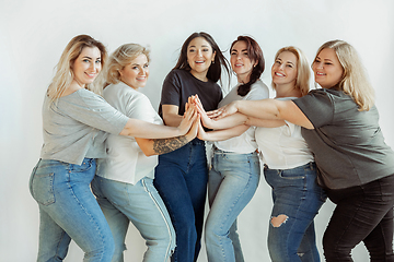 Image showing Young women in casual clothes having fun together. Bodypositive concept.