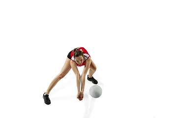 Image showing Young female volleyball player isolated on white studio background in flight and motion