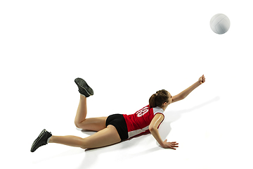 Image showing Young female volleyball player isolated on white studio background in flight and motion