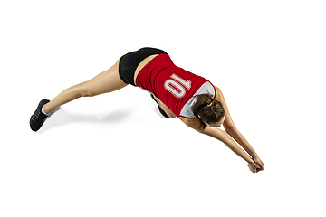 Image showing Young female volleyball player isolated on white studio background in flight and motion