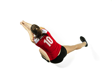 Image showing Young female volleyball player isolated on white studio background in flight and motion