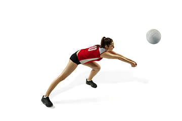 Image showing Young female volleyball player isolated on white studio background in flight and motion