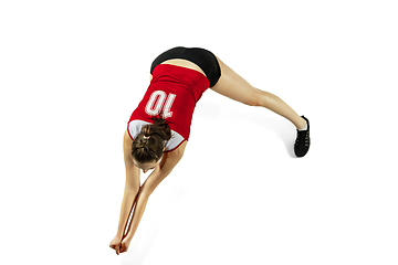 Image showing Young female volleyball player isolated on white studio background in flight and motion