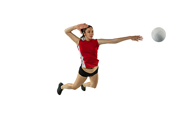 Image showing Young female volleyball player isolated on white studio background in flight and motion