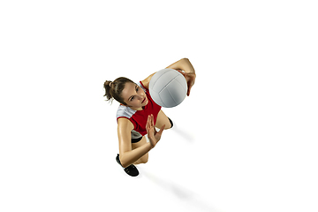 Image showing Young female volleyball player isolated on white studio background in flight and motion