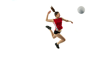 Image showing Young female volleyball player isolated on white studio background in flight and motion