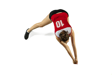 Image showing Young female volleyball player isolated on white studio background in flight and motion