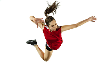 Image showing Young female volleyball player isolated on white studio background in flight and motion