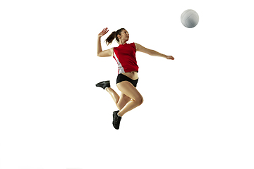 Image showing Young female volleyball player isolated on white studio background in flight and motion