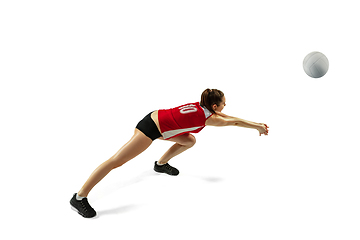 Image showing Young female volleyball player isolated on white studio background in flight and motion