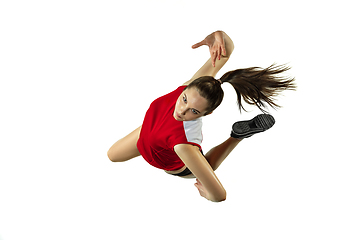 Image showing Young female volleyball player isolated on white studio background in flight and motion