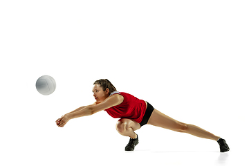 Image showing Young female volleyball player isolated on white studio background in flight and motion