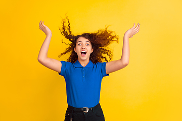 Image showing Caucasian teen\'s girl portrait on yellow background