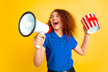 Image showing Caucasian teen\'s girl portrait on yellow background