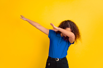 Image showing Caucasian teen\'s girl portrait on yellow background