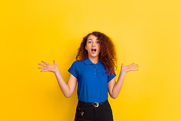 Image showing Caucasian teen\'s girl portrait on yellow background