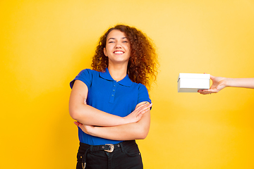 Image showing Caucasian teen\'s girl portrait on yellow background