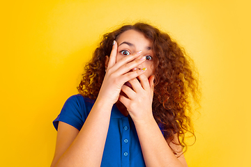 Image showing Caucasian teen\'s girl portrait on yellow background