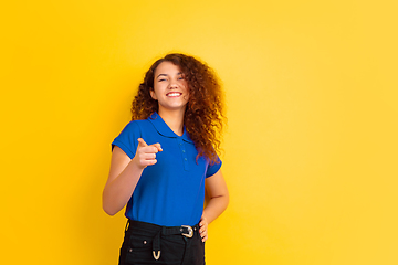 Image showing Caucasian teen\'s girl portrait on yellow background