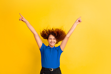 Image showing Caucasian teen\'s girl portrait on yellow background